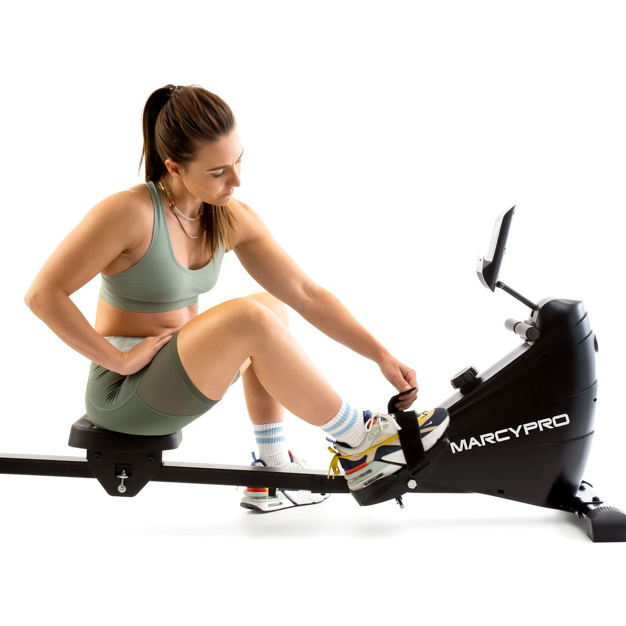 Compact Rowing Machine with Magnetic Resistance – XJ-6860RW Marcy - Model Using Foot Strap