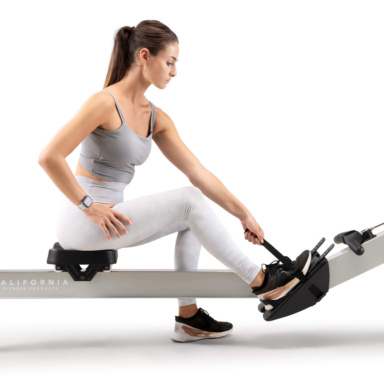 Deluxe Rowing Machine with Adjustable Air Resistance - NS-7874RW California Fitness Products - With Model using Foot Straps
