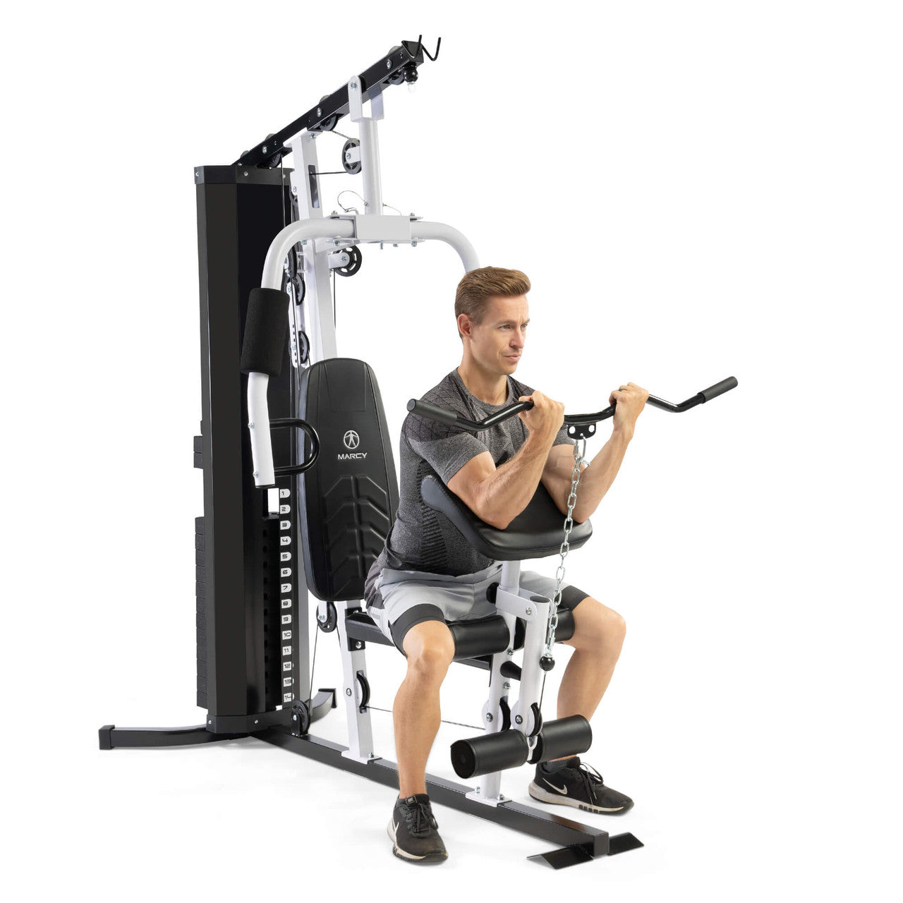 Man using Marcy MWM-8147 Home Gym with 150lb stack for preacher curls and full-body strength training