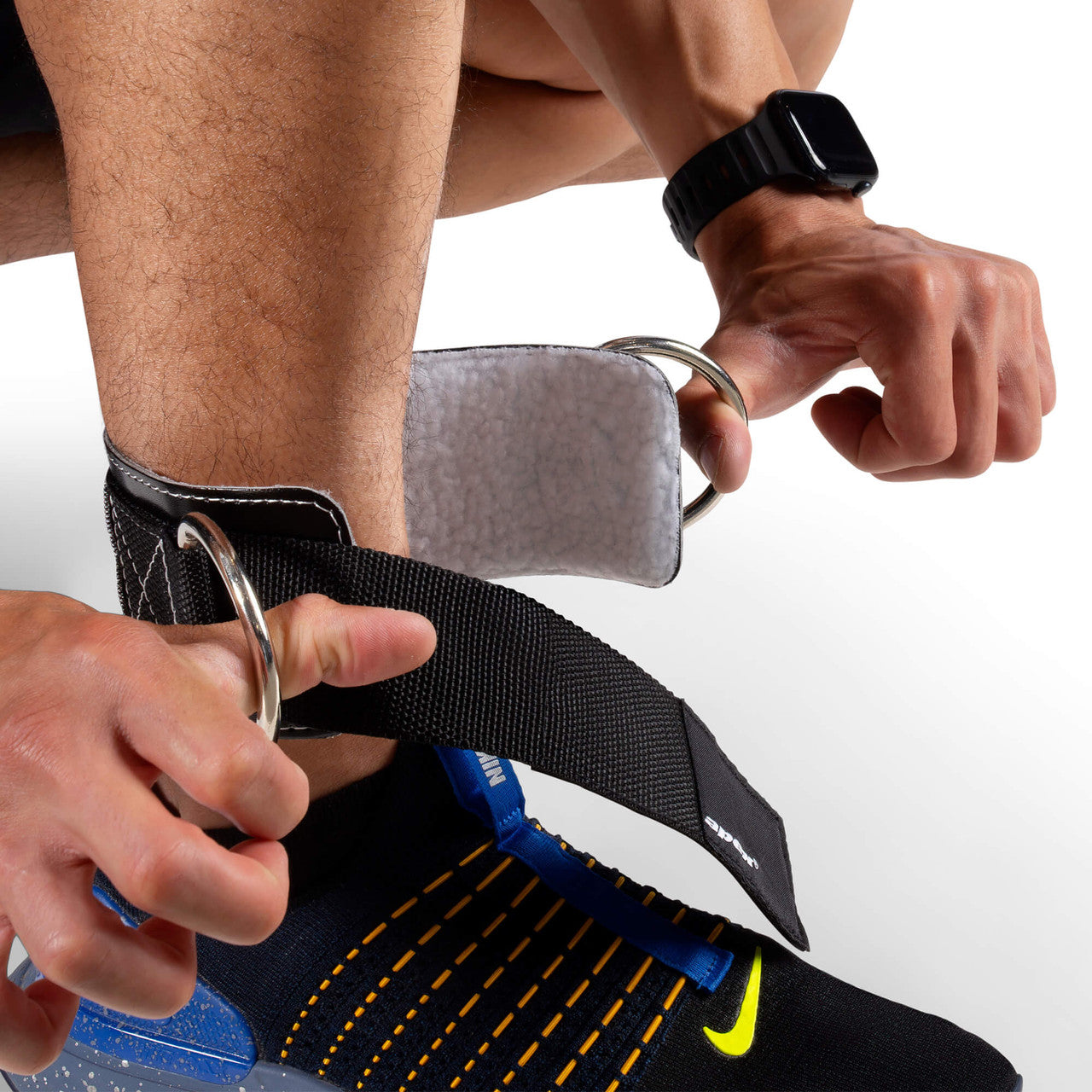 Adjustable 3” Ankle Strap - Heavy Duty Padded Ankle Cuff with D-Rings for Cable Exercises and More B5AS3 - Apex - model putting on ankle strap