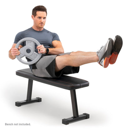 Classic Olympic Plate MCW - Model working out with Weight Plate on Weight Bench