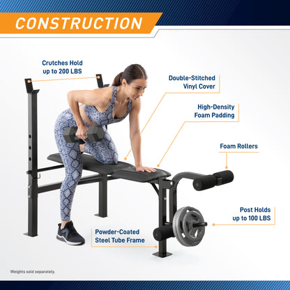 Infographic titled "Construction" showing a woman performing a dumbbell row on the weight bench. Labels highlight durability features: "Crutches Hold up to 200 LBS," "Double-Stitched Vinyl Cover," "High-Density Foam Padding," and "Powder-Coated Steel Tube Frame." The leg developer components are labeled "Foam Rollers" and "Post Holds up to 100 LBS." A disclaimer reads, "Weights sold separately.".