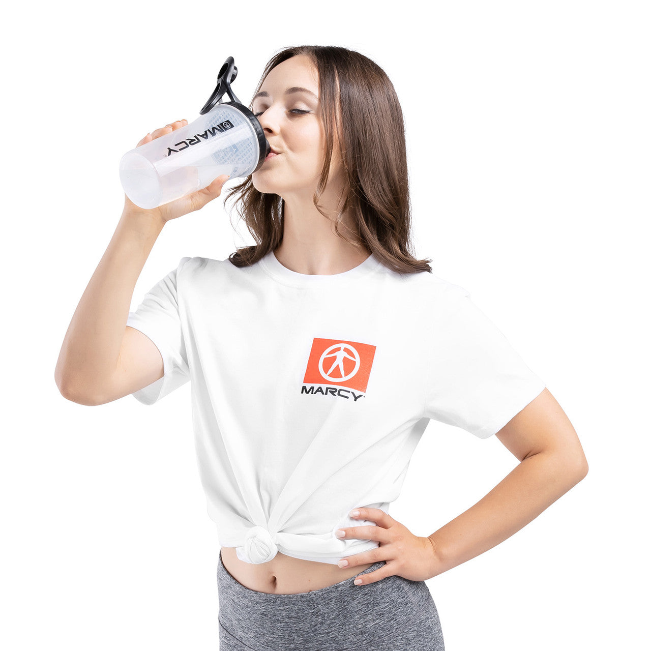 Marcy Non-Spill Shaker Bottle - Clear with Black Lid- MSB-CBL - Female Model Drinking from Bottle