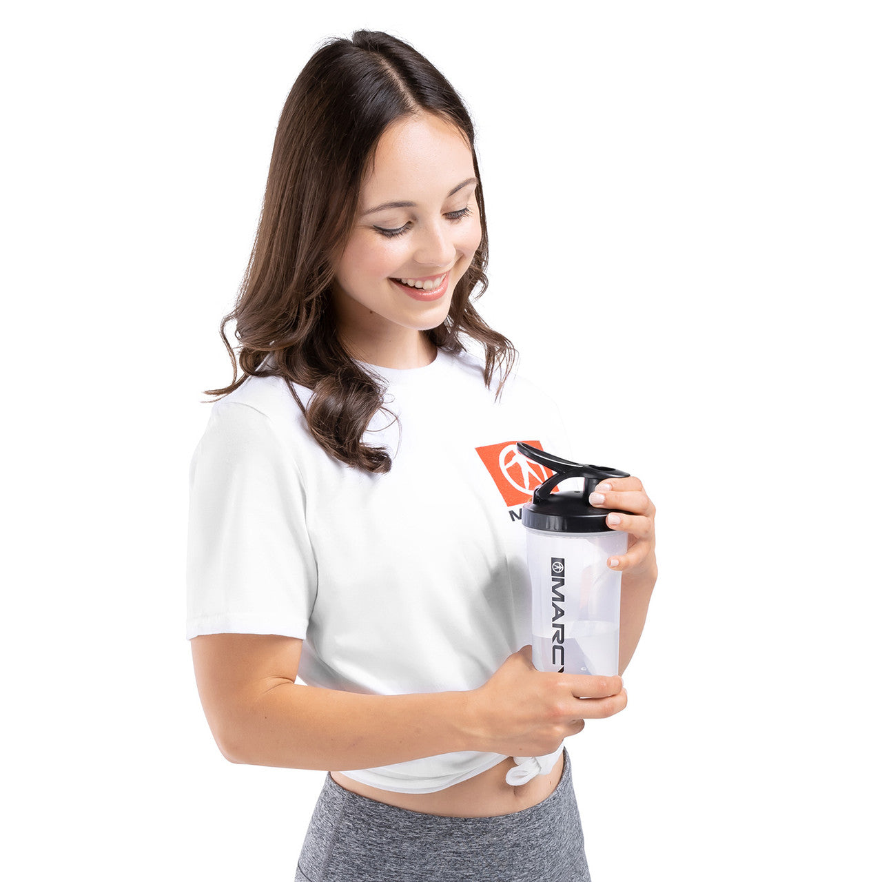 Marcy Non-Spill Shaker Bottle - Clear with Black Lid- MSB-CBL - Female Model putting Lid on Bottle