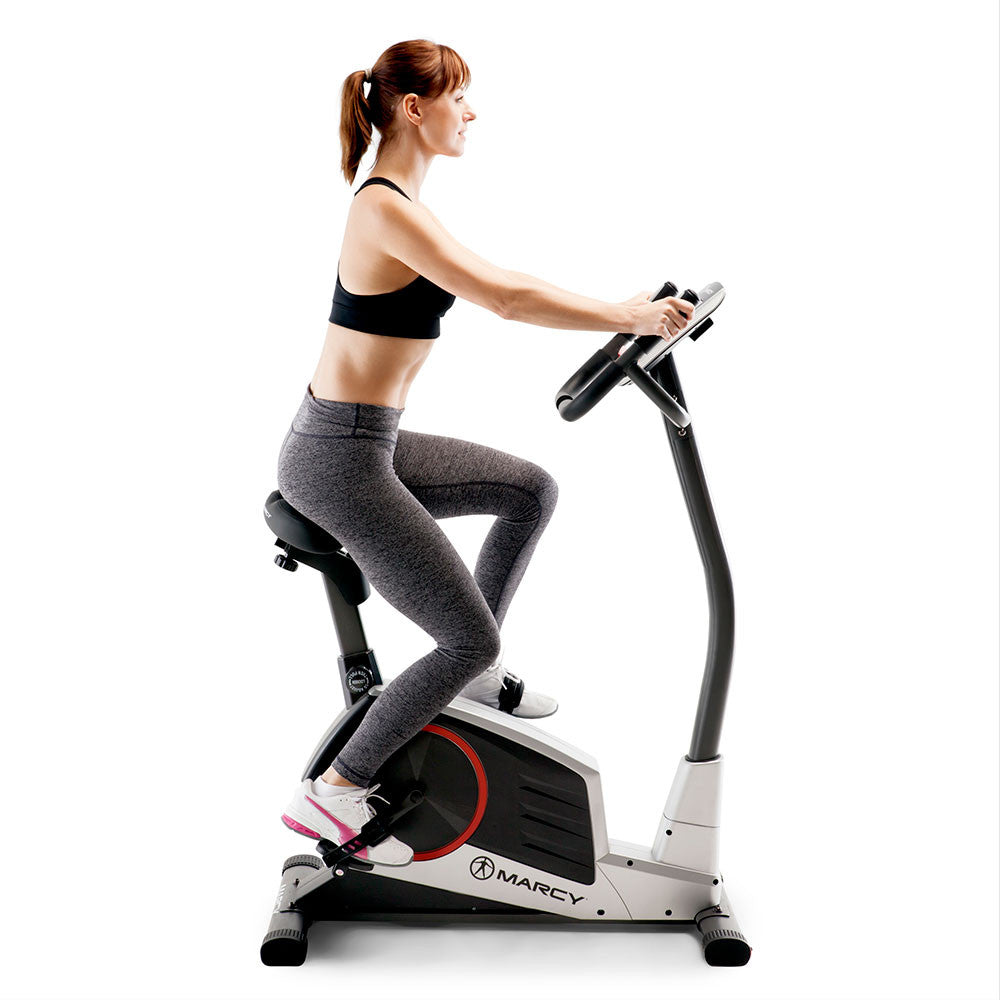 Model using the Regenerating Magnetic Upright Exercise Bike Marcy ME-702