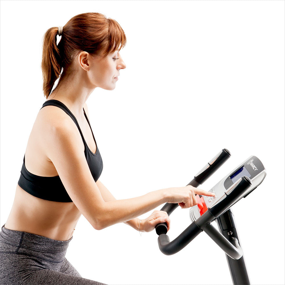 Model using the LCD Computer Display Screen on the Regenerating Magnetic Upright Exercise Bike Marcy ME-702