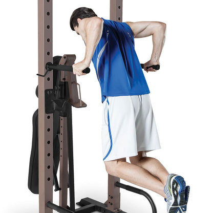 The Steelbody STB-98502 Power Tower with Foldable Bench in use - tricep dips