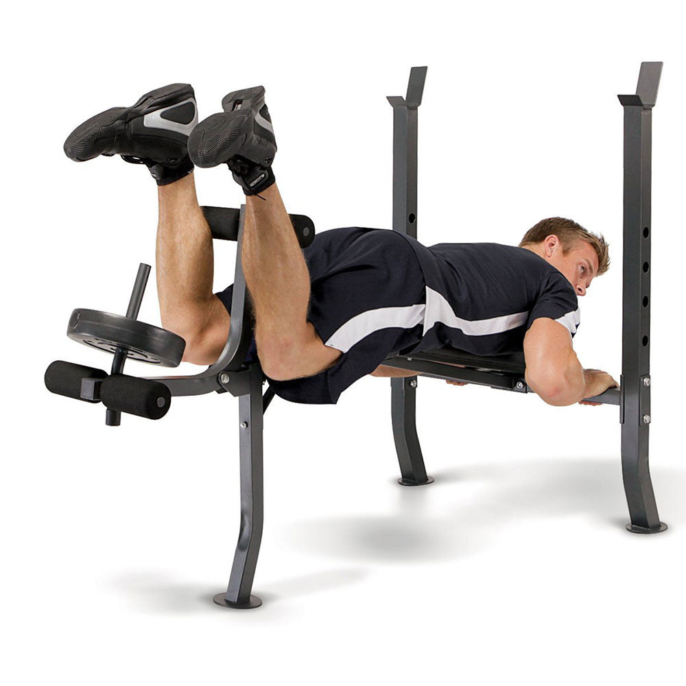 The Standard Bench with 100lb Weight Set Marcy Diamond Elite MD-2082W in use - leg curls